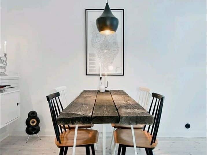 tom dixon pendant light above dining table