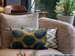 chic sofa in subtle grey & illuminating yellow cushions