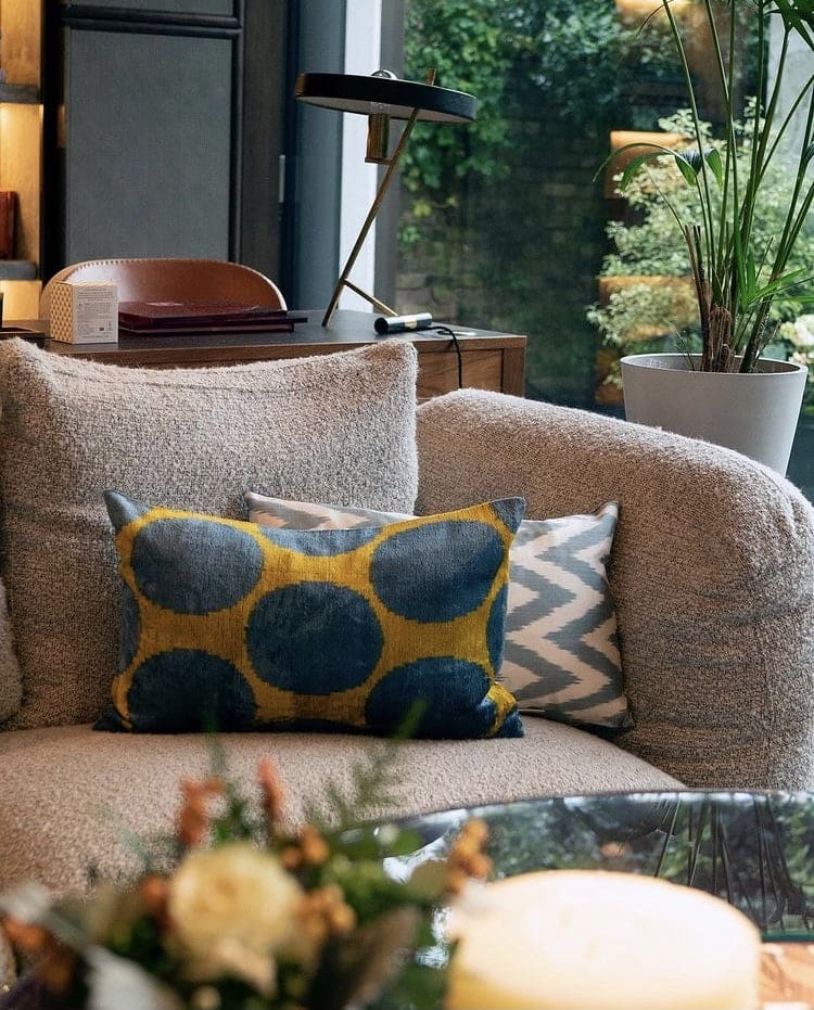 chic sofa in subtle grey & illuminating yellow cushions