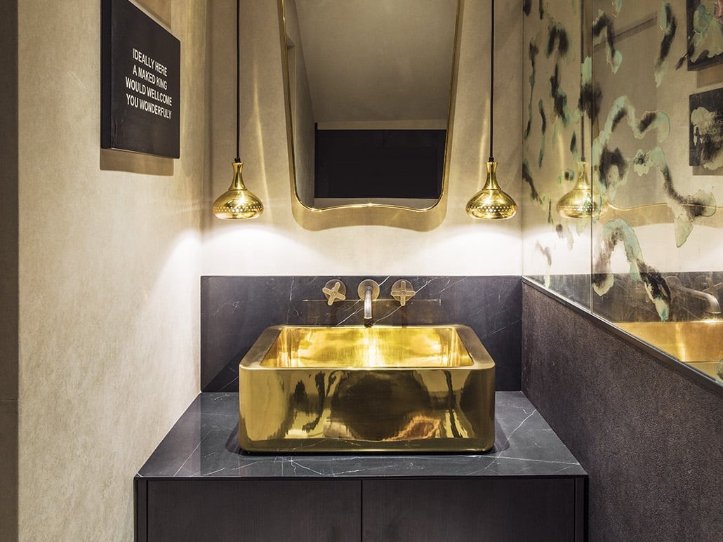 gold basin in powder room