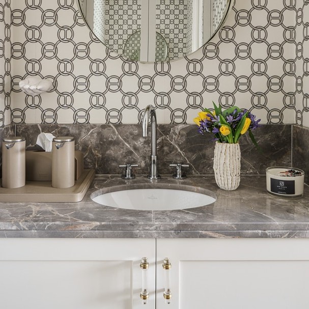 beautiful hermes & silk wallpapered grey office bathroom