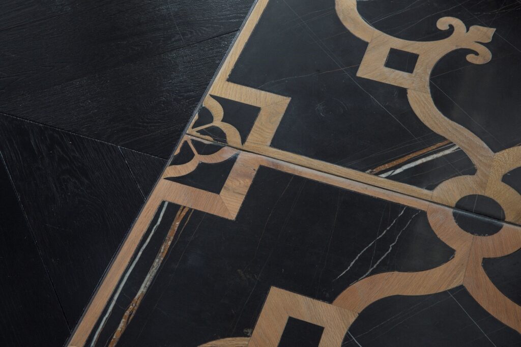 inlaid metallic black tiles