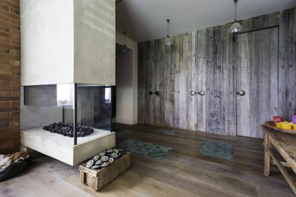 stone fireplace & wooden floor