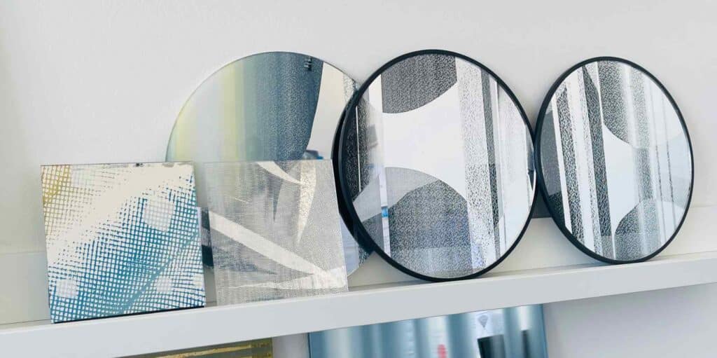 round mirrors on shelf